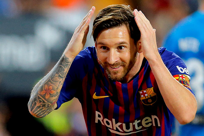 الدوري الاسباني لكرة القدم - المرحلة الــ 23 دربي مدريد على صفيح ملتهب  وبرشلونة لتحصين صدارته