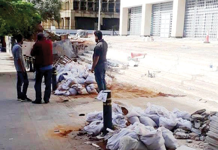 حملة تنظيف وترميم في محيط مصرف لبنان
