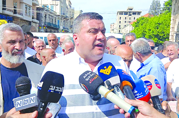 اعتصام نقابي في طرابلس وتلويح بالتصعيد